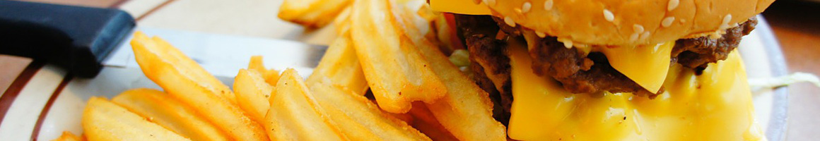 Eating Burger at Christi's Hamburgers restaurant in Waco, TX.